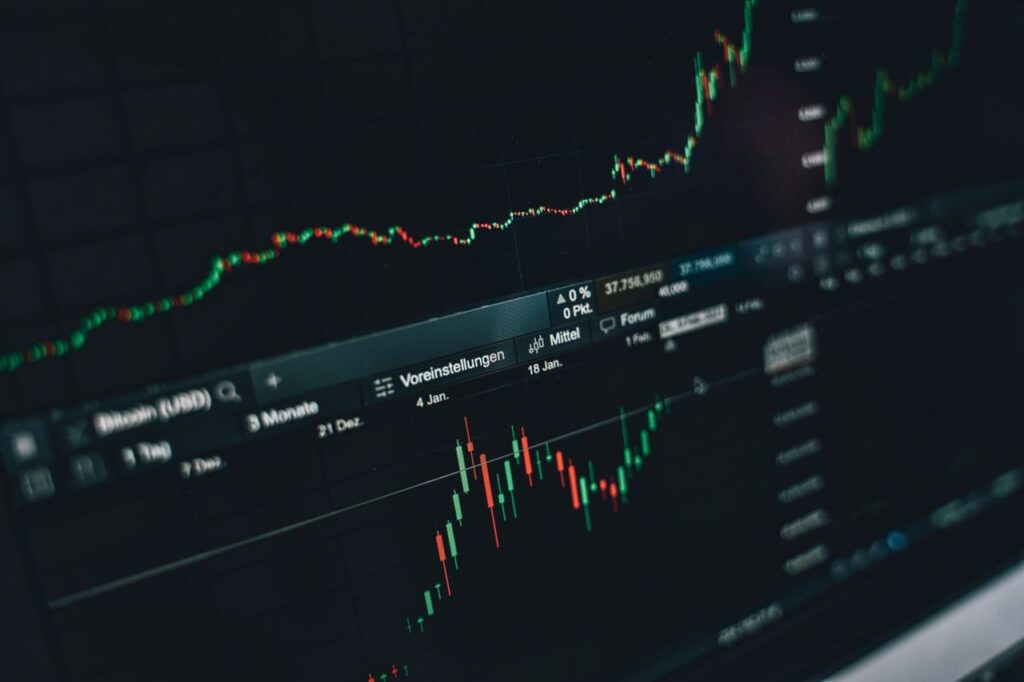 Palantir (PLTR) Stock Price Prediction 2025–2030: Buy, Sell or Hold? 93% Revenue Growth & AI Sovereignty Close-up of a digital market analysis display showing Bitcoin and cryptocurrency price trends.